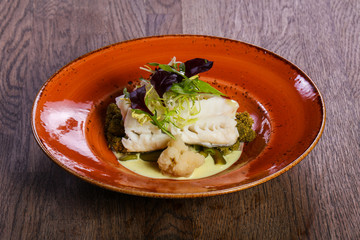 Steamed fith with salad
