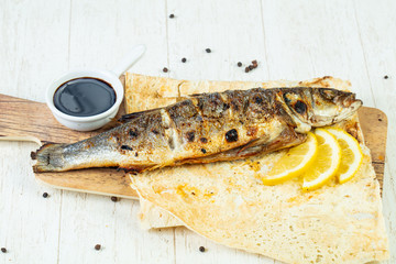 Grilled seabass with lemon