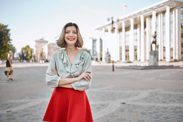 Fototapeta premium woman smiling in a city walk