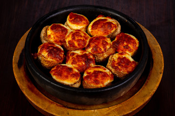 Baked champignons with cheese