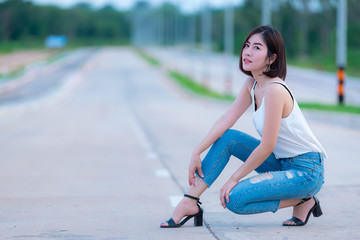 Portrait of beautiful asian woman gold hair outdoor,Happy woman concept,Lifestyle of modern girl,Thailand people