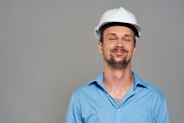 male builder in a white helmet