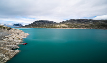 Fototapeta na wymiar The lake near the Austdalsbreen in Jostedal in Norway