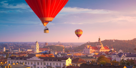 Hot air balloons flying over Vilnius - obrazy, fototapety, plakaty