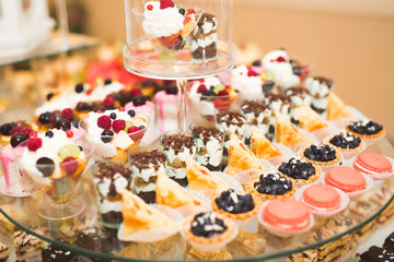 Different kinds of baked sweets on a buffet