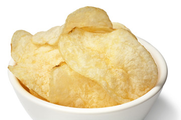 Delicious golden potato chips in a white bowl isolated on white background.