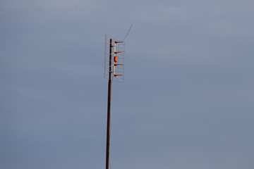 Obraz premium Yagi DVBT tv reception antenna installed on the wall. Broadband signal reception