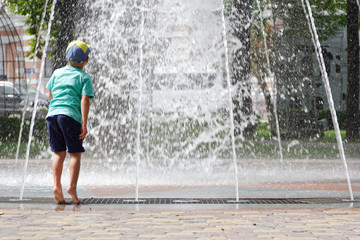 GOMEL, BELARUS Children bathing in the fountain. Square named after. Gromyko.