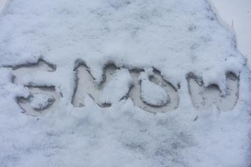 the word snow written in capital letters