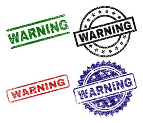 WARNING seal stamps with corroded texture. Black, green,red,blue vector rubber prints of WARNING text with corroded texture. Rubber seals with round, rectangle, medallion shapes.