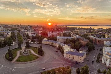 Aerial panorama of city center at sunset time