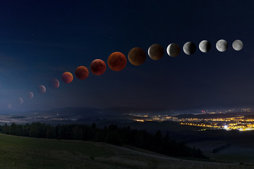 Zaćmienie Księżyca z krwawym księżycem od jego wschodu - obrazy, fototapety, plakaty