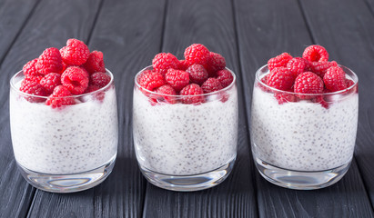 Chia pudding in glass with raspberry