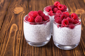 Chia pudding in glass with raspberry