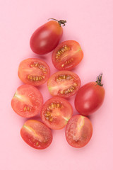 Cherry tomatoes on a colored background