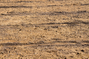 Plowed field with  traces in view