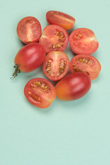 Cherry tomatoes on a colored background