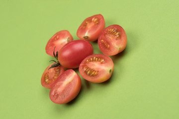 Cherry tomatoes on a colored background