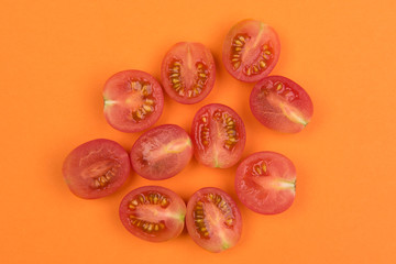 Cherry tomatoes on a colored background