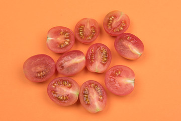 Cherry tomatoes on a colored background