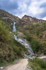 Fototapeta na wymiar At the beautiful waterfall on the spring day of April 9, 2018 track around Annapurna, Himalaya, Nepal.