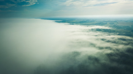 Fototapeta na wymiar Misty sunrise over countryside path Aerial view Latvia