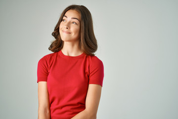 cute woman smiling in red t-shirt