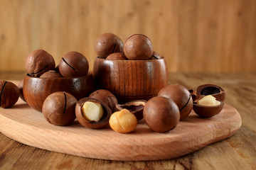 Macadamia nuts on a wooden board