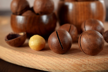 Macadamia nuts on a wooden board