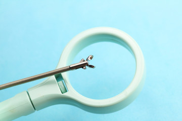 flexible endoscopy forceps, oval cup coated in a blue background