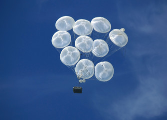 Descent by parachute
