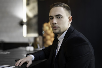 Smartly dressed businessman islated portrait