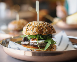 Close up of fresh big tasty burger.