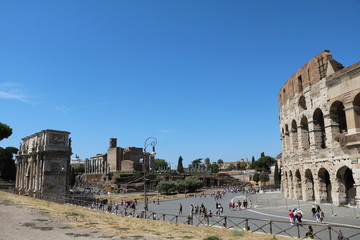 Fototapeta na wymiar The Colosseum and The Arco di Costantino in Rome, Italy