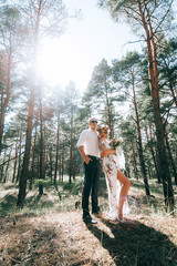 Fototapeta na wymiar bride and groom in the forest