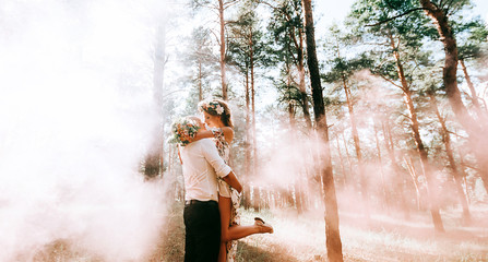 Obraz premium bride and groom in the forest