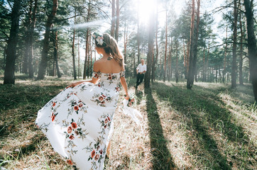 bride and groom in the forest