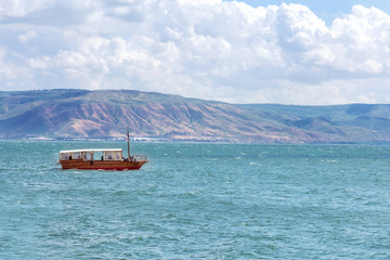 Boat at sea of Galilee - obrazy, fototapety, plakaty
