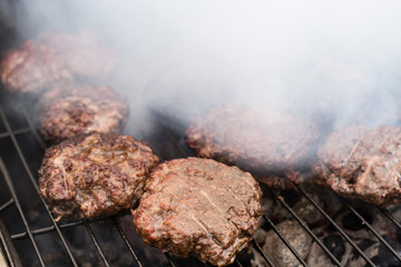 Flame Broiled Hamburgers On Grill, Seasonal Cookout 