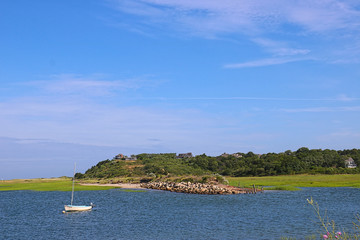 Fototapeta na wymiar Landscape New England Harbor with kayaks and boats