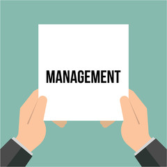 Man showing paper MANAGEMENT text 
