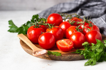 Cherry tomatoes with herbs (parsley), salt and pepper. Organic food. Ingredients for preparation tomato juice or soup (gazpacho).