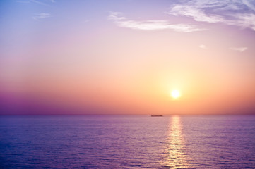 ship at sea at sunset