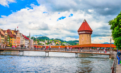 City center with famous Chapel Bridge and lake in Lucerne, Switzerland