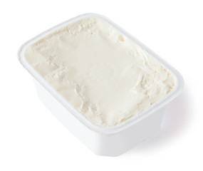 Cream cheese, packed, isolated on white background.