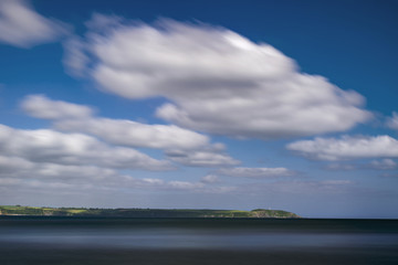 The beautiful summer sun bathes the coastline of Charlestown Harbour