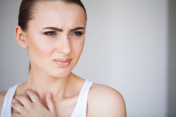 Pain. Beautiful Young Woman Feeling Sick and Has a Pain in the Neck