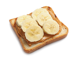 Toast bread with tasty peanut butter and banana slices on white background