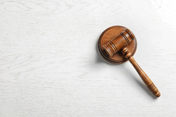 Judge's gavel on light background, top view. Law concept
