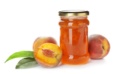 Jar with peach jam and fresh fruit on white background